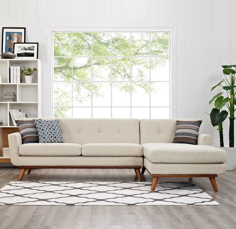 Giuliana 104″ Wide Faux Leather Reversible Sofa & Chaise with Ottoman